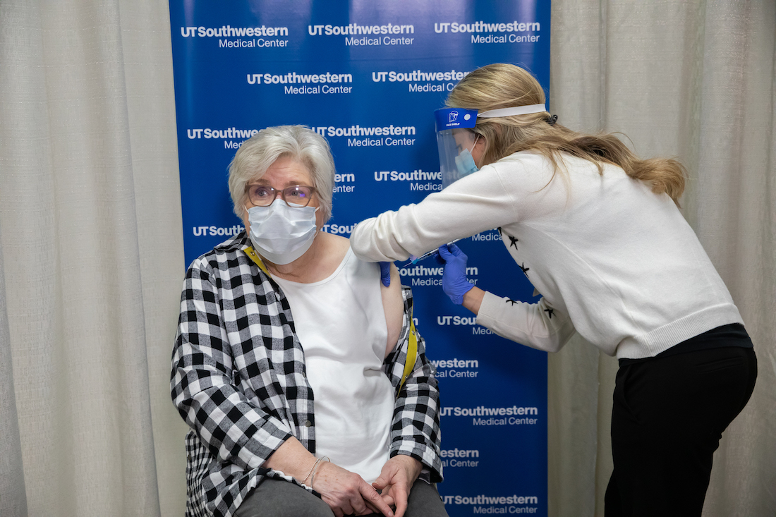 An elderly person recieving the Covid-19 vaccine