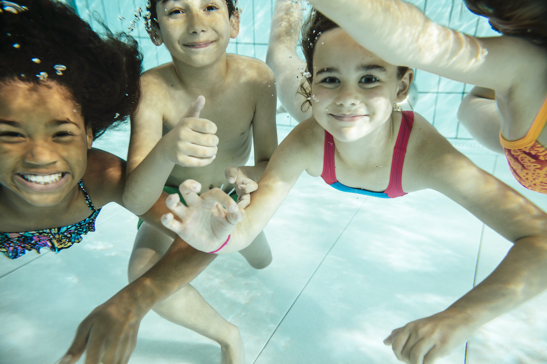 Adults are typically at lower risk for swimmer's ear than children due to their wider ear canals.