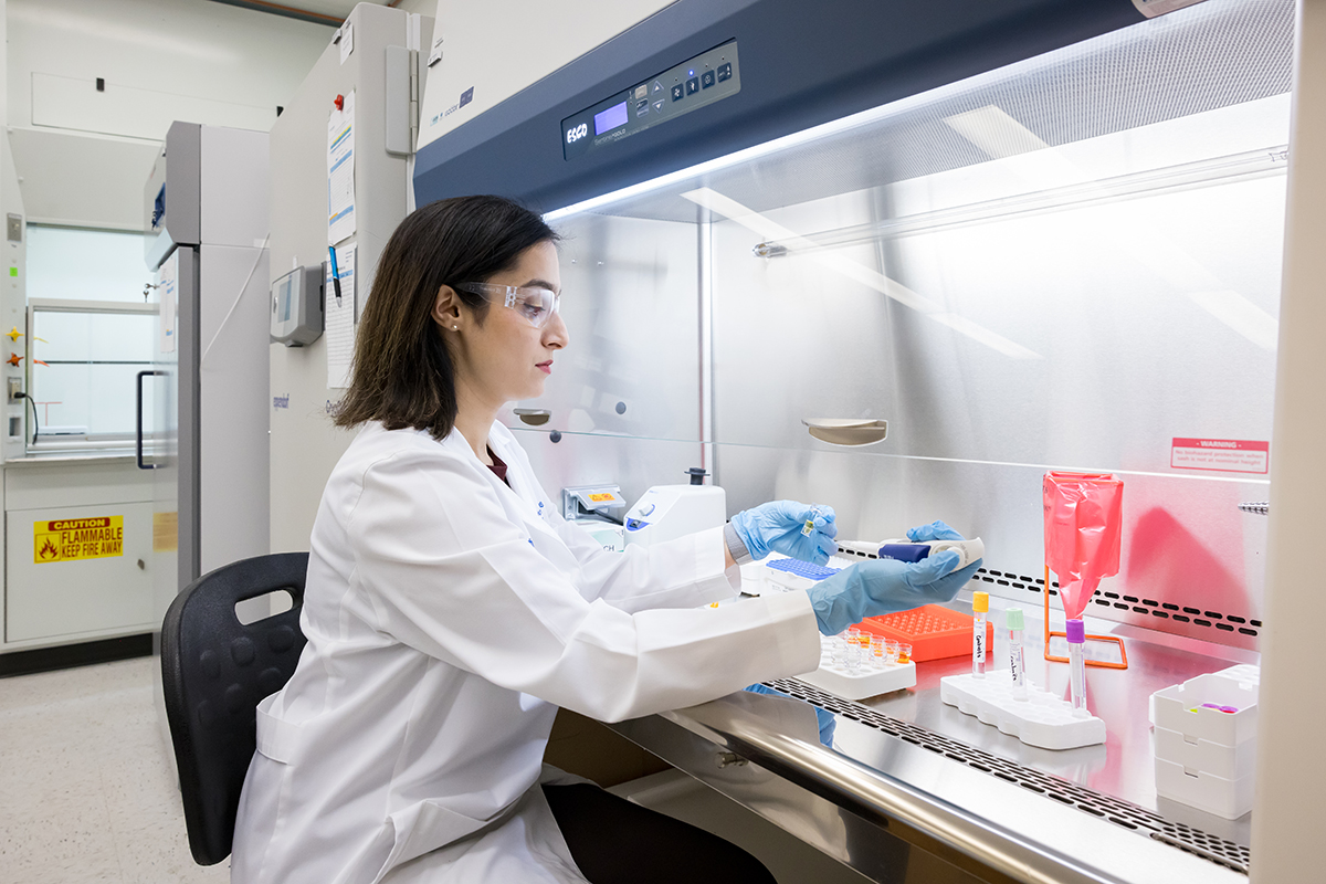 a CMRU Lab member working in the Fume Hood